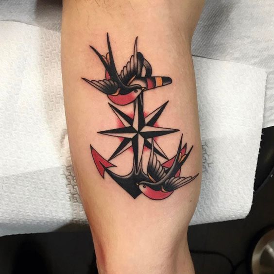 Nautical star bicep tattoo