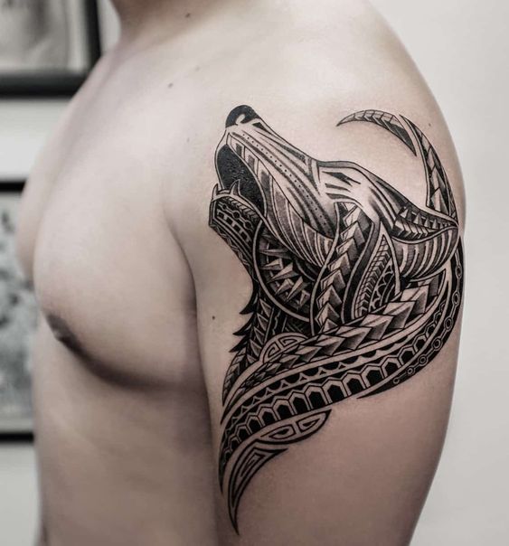 Tribal wolf shoulder tattoo