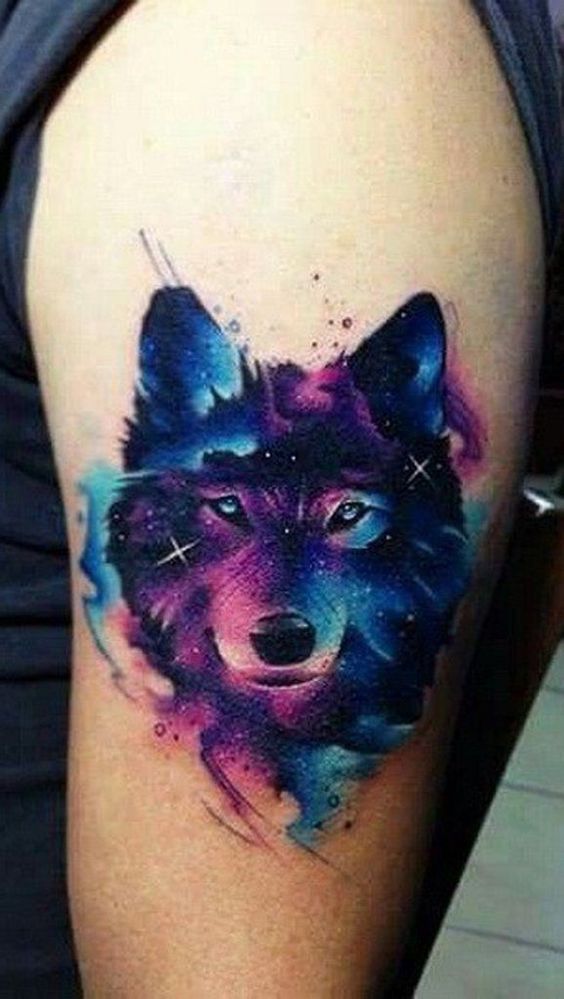 watercolor wolf bicep tattoo