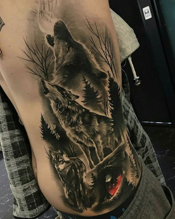 Wolf tattoo on the ribs