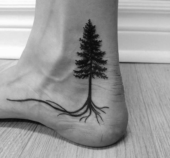 Pine tree ankle tattoo