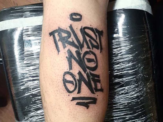 Trust No One tattoo meaning