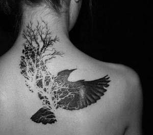 negative space back tattoo