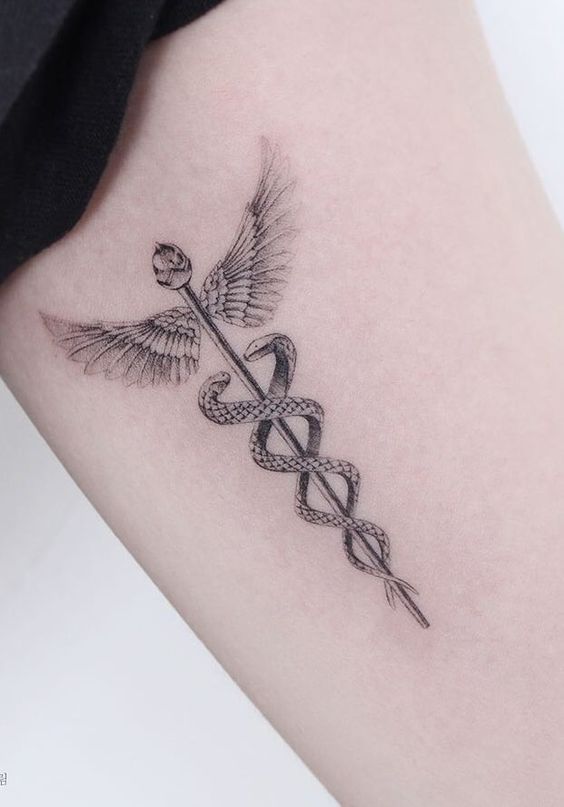 Caduceus tattoo as medical symbol on your body