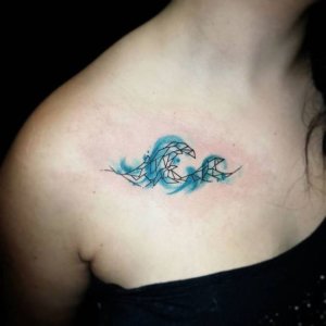 Geometric wave tattoo and a modern take on a classic symbol 1