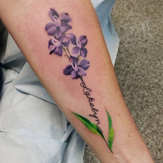 Forearm purple Larkspur tattoo