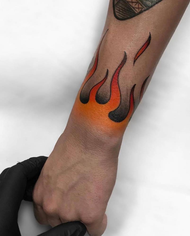 10 flame tattoos on wrist heat up your look