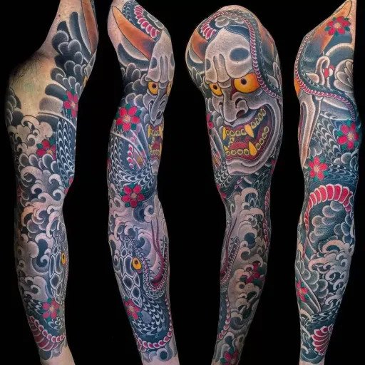 Embrace the power of Japanese mythology with Oni Mask sleeve tattoo