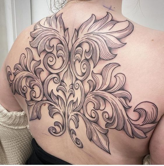 Filigree tattoo on the back