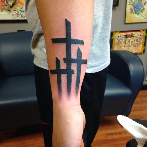 Forearm 3 cross tattoo