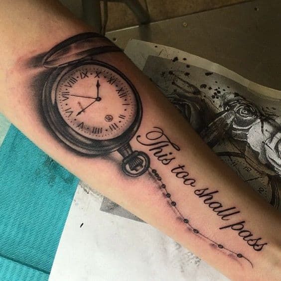 Forearm this too shall pass tattoo with clock