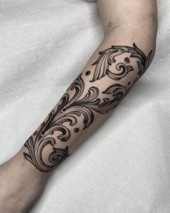 10 delightful design vintage filigree tattoo on forearm 5