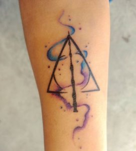 20 watercolor Deathly Hallows tattoos with a pop of colors 19