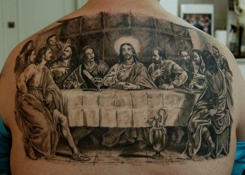 Last supper back tattoo: Honoring faith through ink