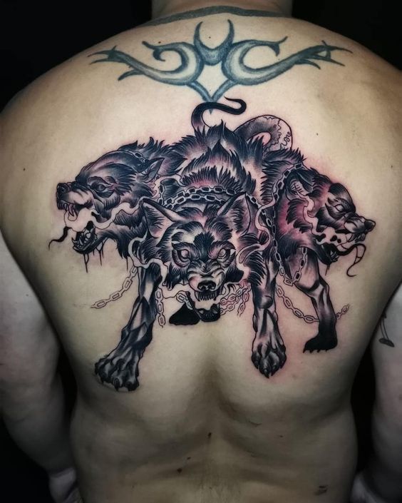 Bold back Cerberus tattoo design emphasizing the fierce nature of the guardian of Hades.