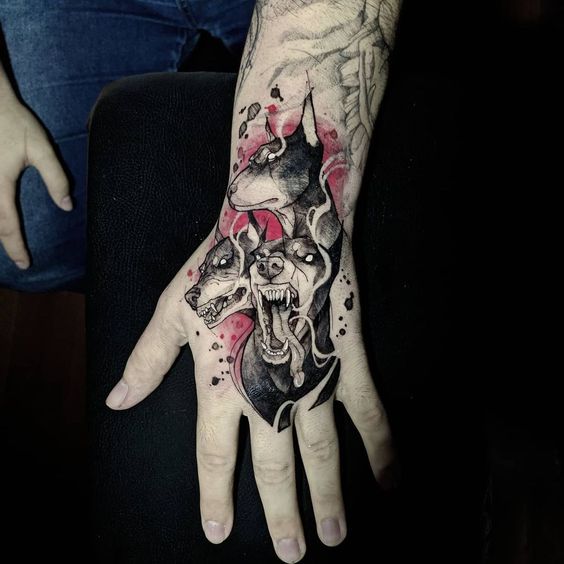 Artistic hand Cerberus tattoo artwork representing the multi-faceted aspects of the mythical creature.