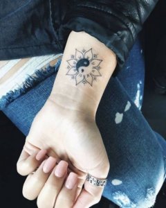 Small Yin Yang tattoo for inner peace 4