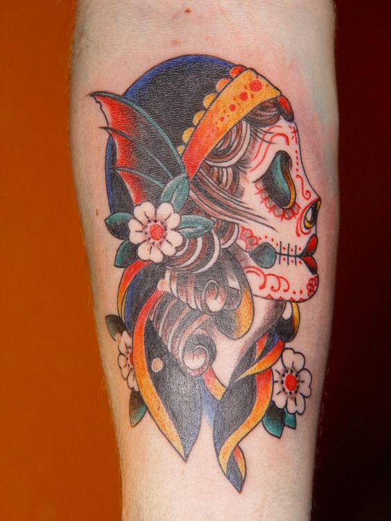 Captivating and timeless: 15 traditional La Catrina tattoos