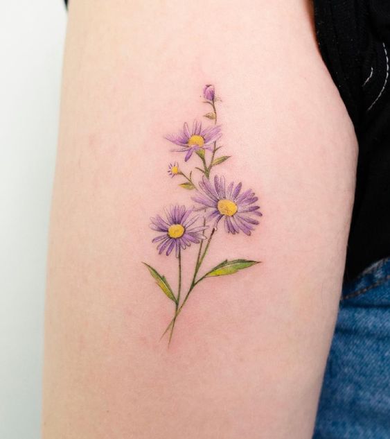 Meaning of Aster flower tattoo 1