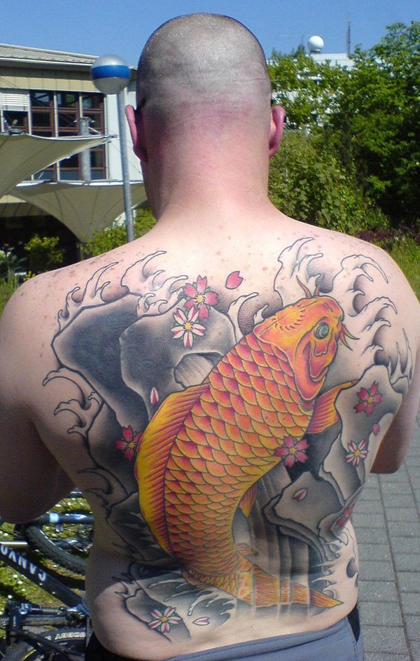 Yellow Fish tattoo on the back