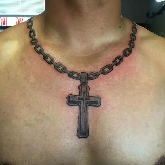 Cross on the chest tattoo