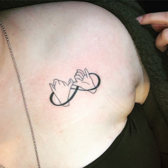Shoulder pinky promise tattoo
