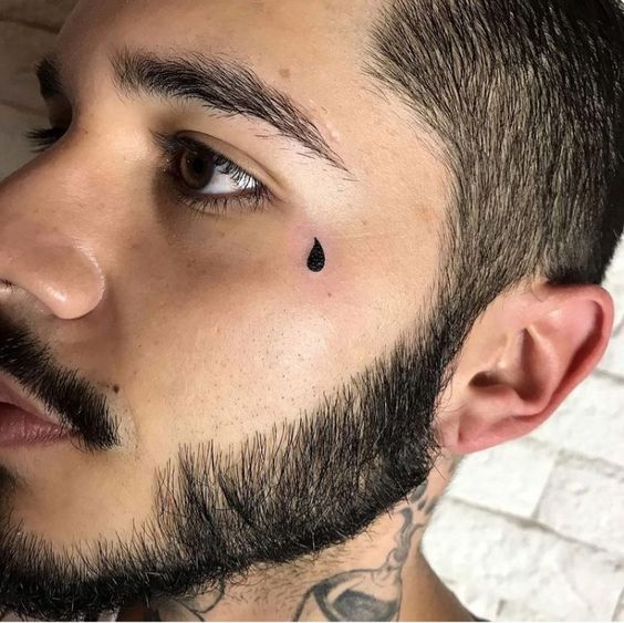 One tear tattoo