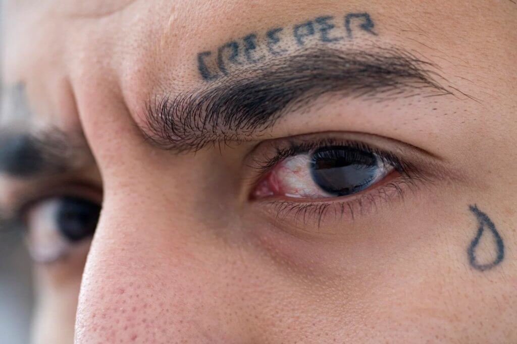One tear tattoo