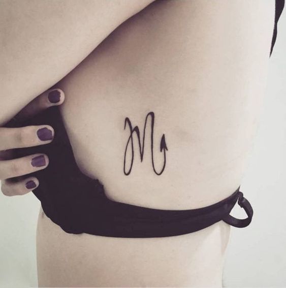 Scorpio zodiac symbol minimalist tattoo: Perfect for those who prefer simplicity