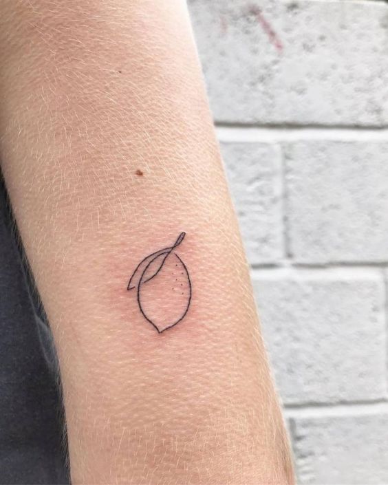 Simple lemon tattoos: A fresh take on minimalist body art