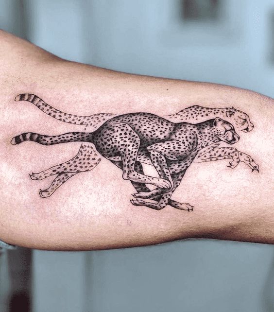 Cheetah tattoo design symbolizing speed, agility, and grace.