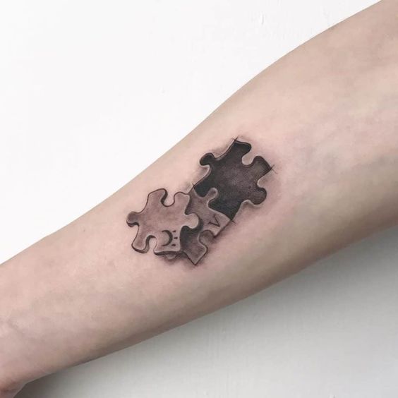 Meaning of Puzzle Piece Tattoos Symbolic Ink with a Message 1