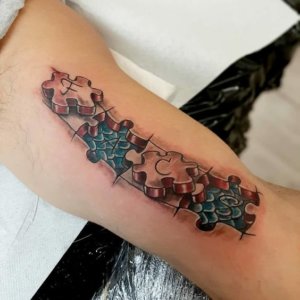 Meaning of Puzzle Piece Tattoos Symbolic Ink with a Message 2