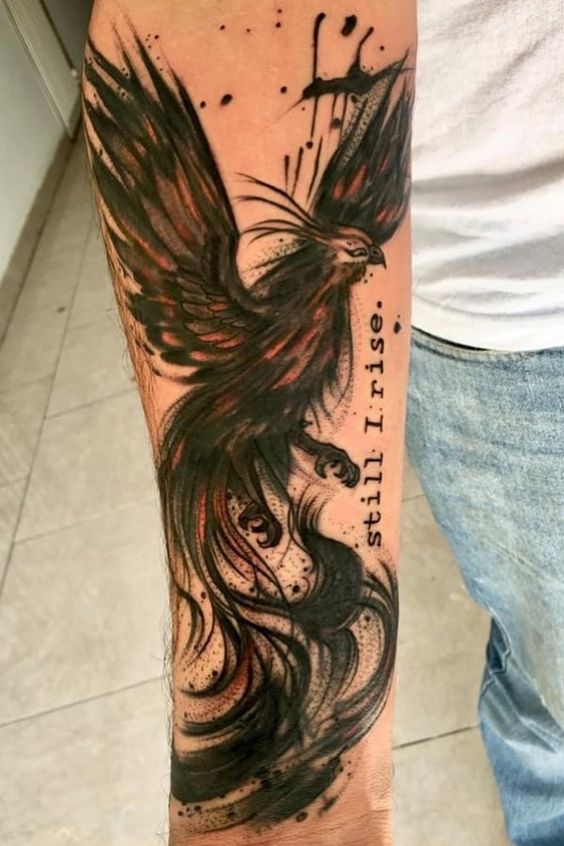 Detailed 'Still I Rise' forearm tattoo design with phoenix, capturing the essence of hope, resilience, and unwavering spirit.