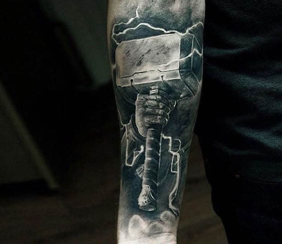 Abstract lightning tattoo design, capturing the ethereal beauty and raw energy of Hammer of Thor on forearm.