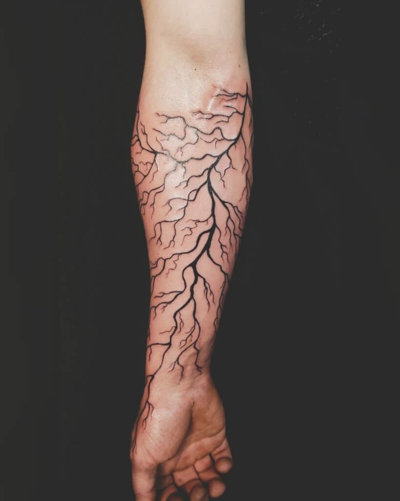 lightning bolt tattoo on hand