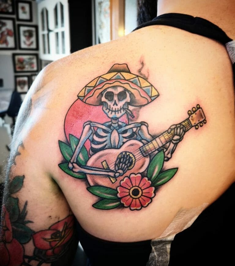 Dia de los Muertos Tattoo Inspirations: Mariachi Magic in 10 examples